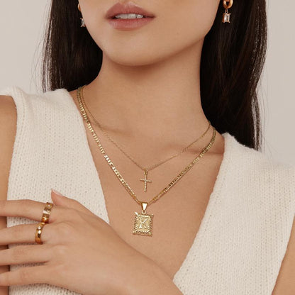 Set de Collar con Inicial y Cruz | Oro