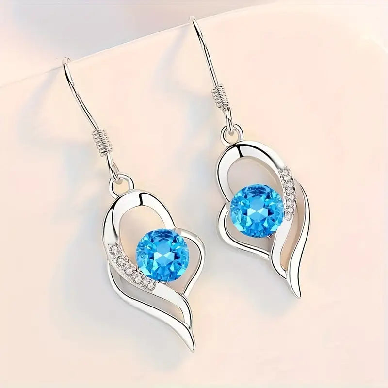 Aretes Colgantes Corazón Eclipse | Oro Blanco