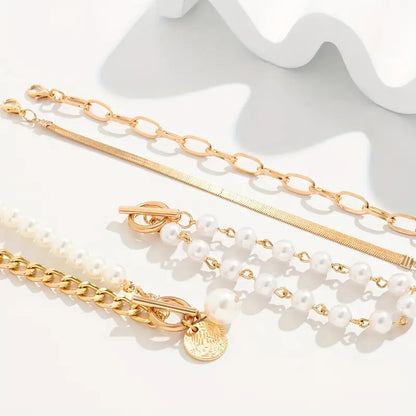 Set de Pulseras Chic de 4 Piezas - Serpiente, Perlas y Eslabones | Oro