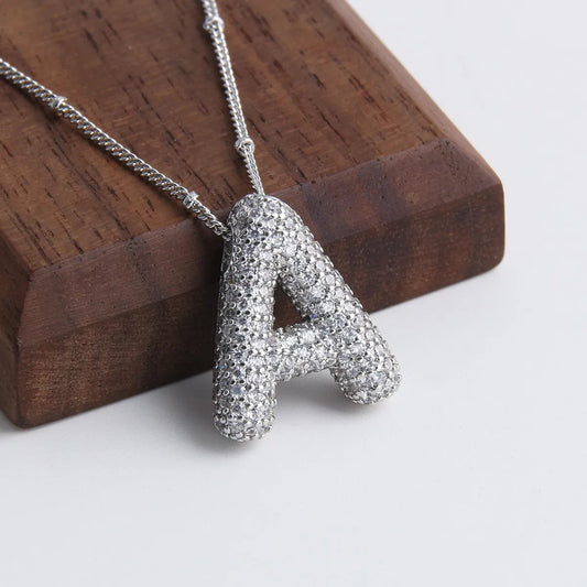 Set de Collar con Inicial Bubble | Oro Blanco
