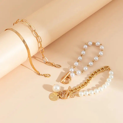 Set de Pulseras Chic de 4 Piezas - Serpiente, Perlas y Eslabones | Oro